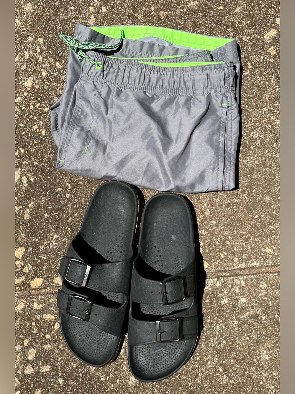 1 Gray Swim Trunks  M
 with Neon Green Trim  1 Black Double-Buckle Slides 11/12